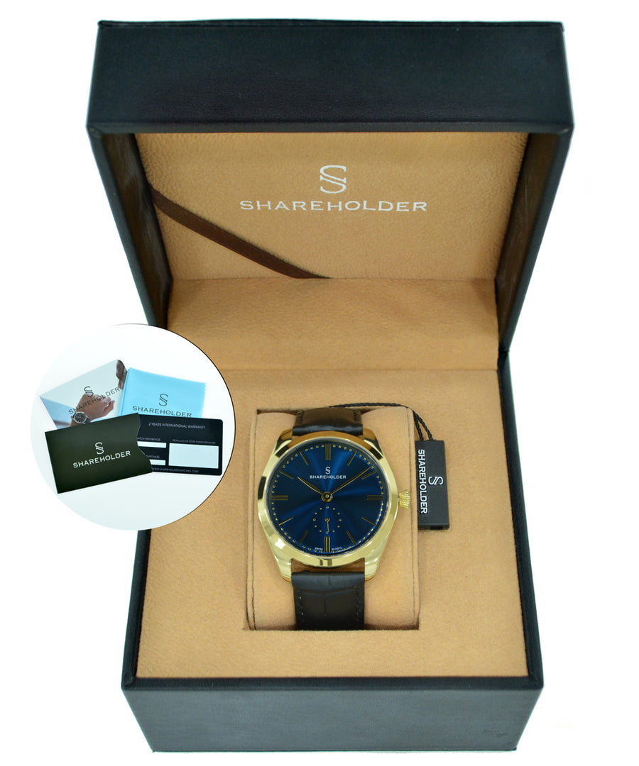 Navy Blue Dial / Gold Case / Black Strap